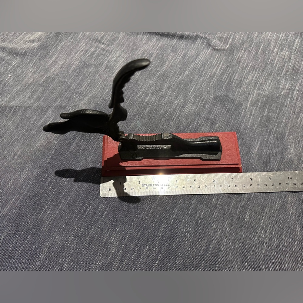 vintage nut cracker Iron Cat On Wood